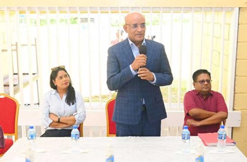 Vice-President Dr. Bharrat Jagdeo speaking to the residents of Essequibo Coast during his two-day outreach. Also pictured are Senior Minister in the Office of the President with Responsibility for Finance and Public Service Dr. Ashni Singh (right), and the Minister of Local Government and Regional Development Sonia Parag