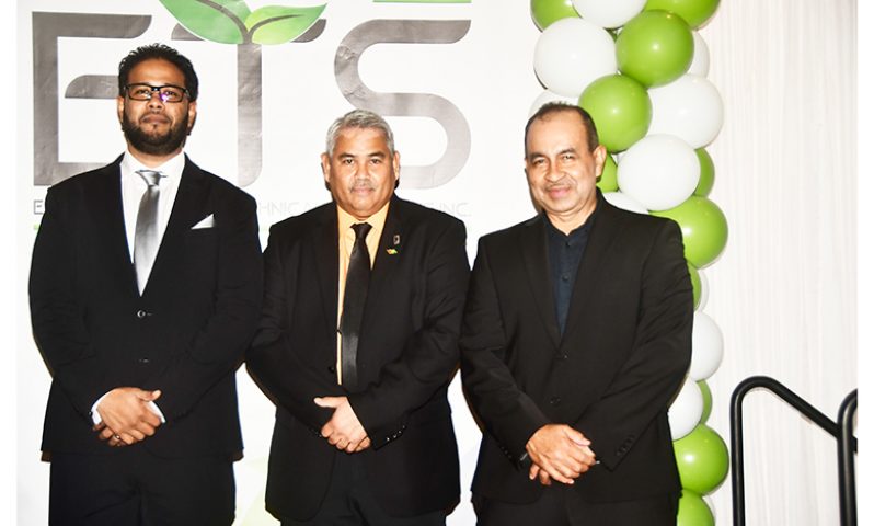 (From left) General Manager, Shane Singh; Director, Denis Latiff and Hand-in-Hand Executive Director, Keith Evelyn (Adrian Narine photo)