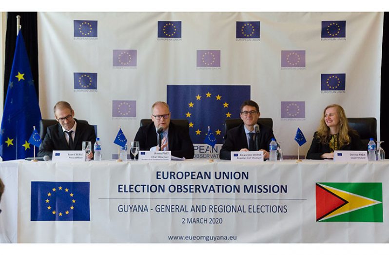 European Union Election Observation Mission (EU EOM) Chief, Urmas Paet, addressing the press in the presence of (L-R) Press Observer, Evan Eberle; Deputy Chief Observers, Alexander Matus and Legal Analyst, Dorota Ryza