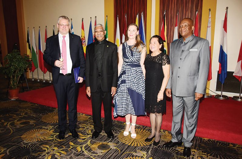 President Granger (second from left), First Lady, Sandra Granger (second from right) and Minister of State Joseph Harmon (extreme right) share a moment with EU Ambassador, Videti? and Mrs. Videti? (Adrian Narine photo)