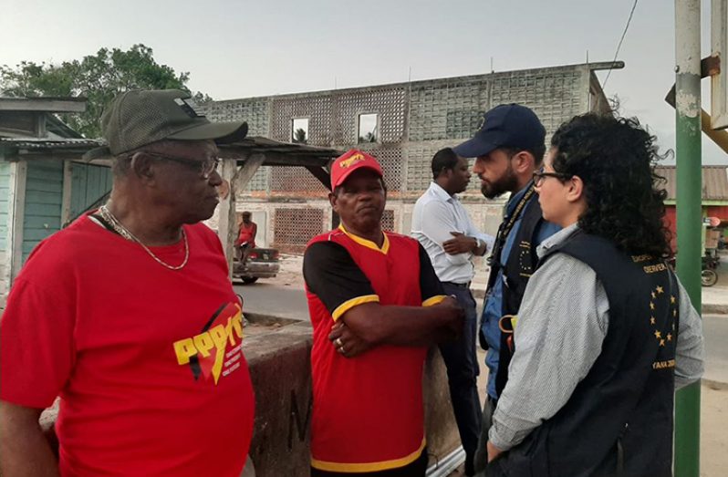 Long-term observers in Region 10 at a PPP/C rally on Burnham Drive