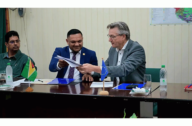 Signing of the aide-mémoire of the second meeting of the Joint Monitoring and Review Committee (JMRC) of the Guyana-EU FLEGT VPA by Minister of Natural Resources Vickram Bharrat, and Ambassador of the European Union to Guyana, Rene van Nes