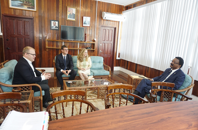 Chief Observer of the EU Election Observation Mission, Urmas Paet (left), meets with Attorney General, Basil Williams (right). Accompanying Paet were Deputy Chief Observer, Alexander Matus, (second from left) and Legal Analyst of the Mission, Dorota Ryza (Elvin Croker photo)