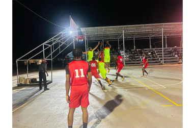 Eagles Eagles in red on the offensive end against Pacesetters in lime green defending Wednesday night