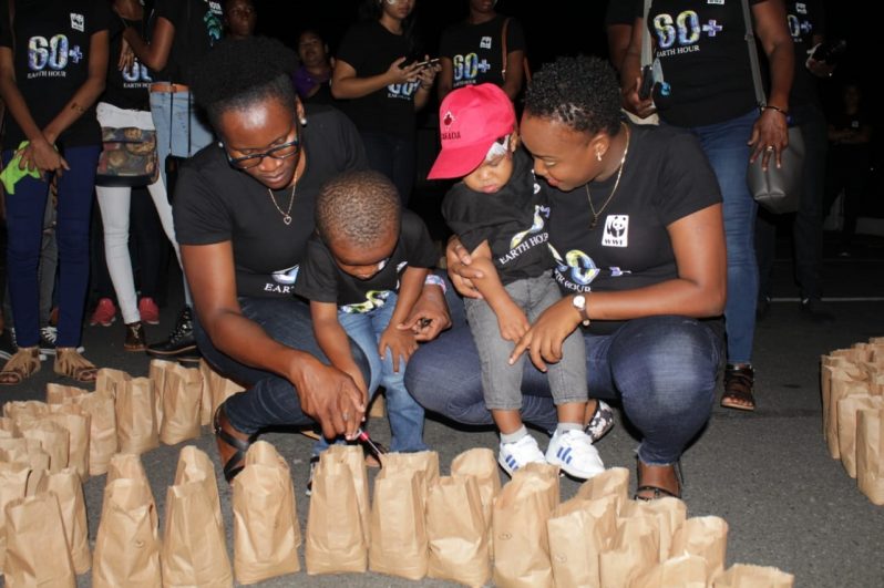 These young children joined with citizens across the world to observe Earth Hour by lighting candles