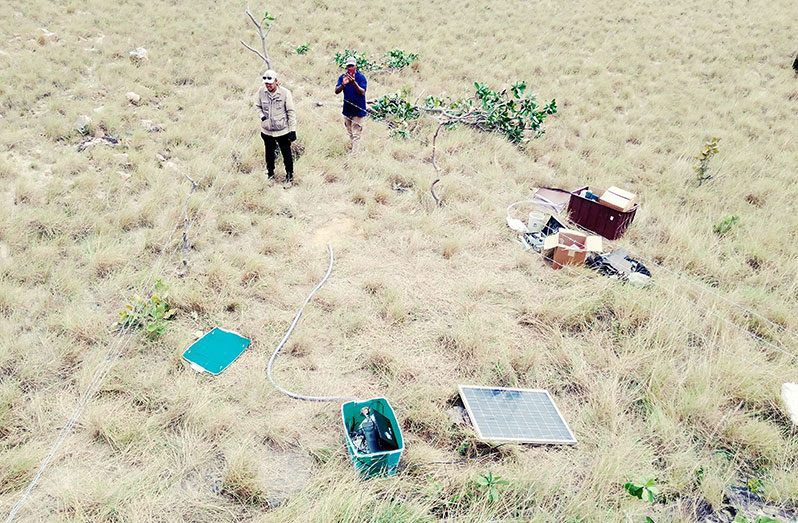 The equipment to monitor the aftershocks in ‘Deep South’ Rupununi being installed (Photo provided by the Civil Defence Commission)