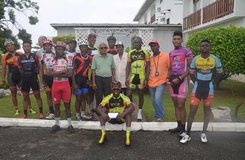 Prize winners of yesterday’s R&R International sponsored cycle road race strike a pose after receiving their prizes.