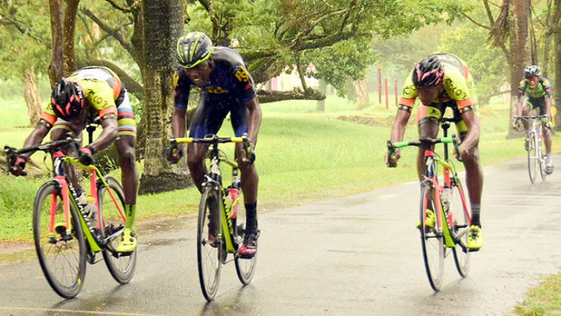 Victory! Hamzah Eastman (left) executes a perfect bike throw to pip Romello Crawford (middle) while Jamual John settles for third. (Adrian Narine photo)