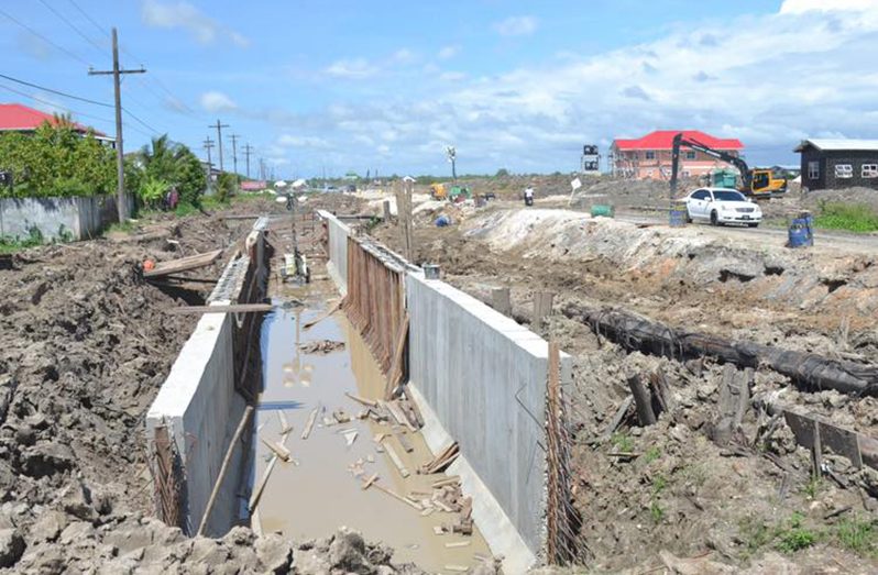 Massive drainage infrastructure taking shape on what is popularly known as “Eccles Dumpsite Road” (Office of the President photos)
