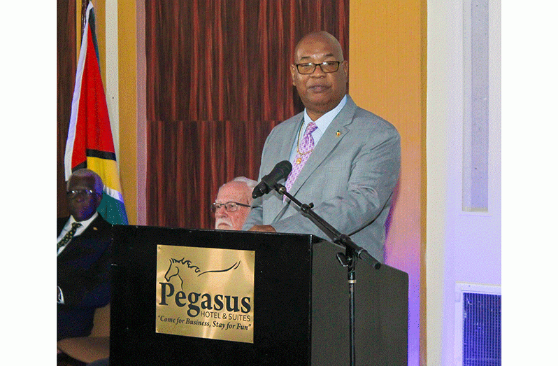 Minister of Public Works Bishop Juan Edghill delivering remarks at Monday’s opening of the National Aviation Seminar  (Shaniece Bamfield photo)