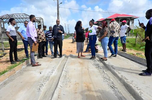 Minister of Public Works, inspecting one of the roads in Region Six that was driven on before its completion