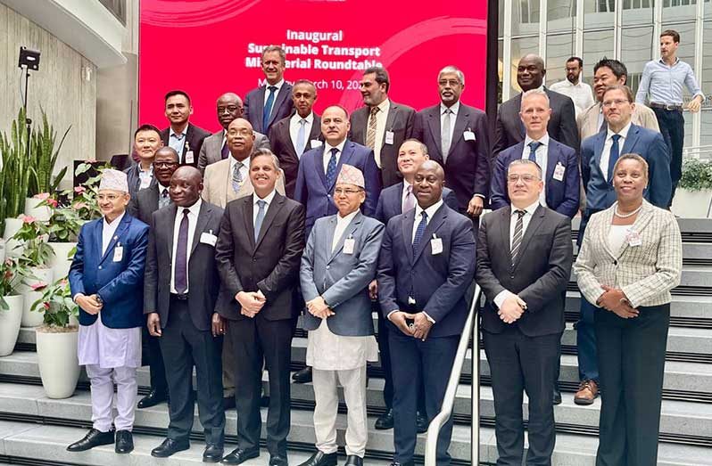 Minister of Public Works, Bishop Juan Edghill (second row, second from left), flanked by other government officials at the Transforming Transportation 2025 conference in Washington, DC