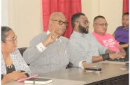 Edghill Minister of Public Works, Bishop Juan Edghill, engages truckers in Lethem on Friday, on the International Road Transport Agreement (IRTA) between Guyana and Brazil