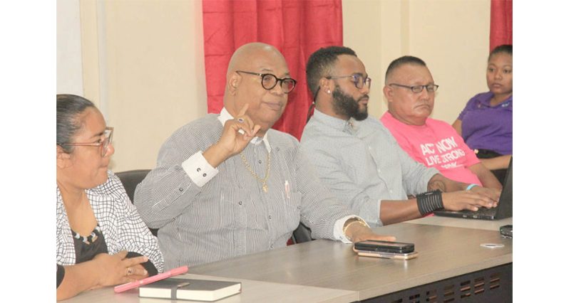 Edghill Minister of Public Works, Bishop Juan Edghill, engages truckers in Lethem on Friday, on the International Road Transport Agreement (IRTA) between Guyana and Brazil