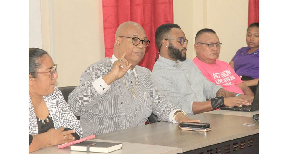 Edghill Minister of Public Works, Bishop Juan Edghill, engages truckers in Lethem on Friday, on the International Road Transport Agreement (IRTA) between Guyana and Brazil