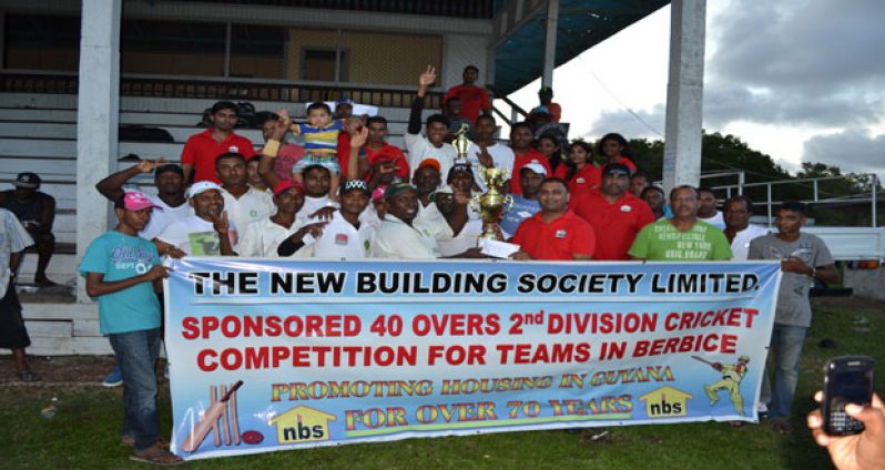 Mr Rana Persaud, Manager of NBS hands over the winning trophy to D’Edward captain Jaipaul Heeralall in the presence of other staffers of NBS, players from the victorious team and BCB officials.