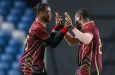Nathan Edward (left) of the Leeward Islands Thunder celebrates one of his five wickets with Karima Gore during their match against the Barbados Pelicans (Photo courtesy CWI Media
