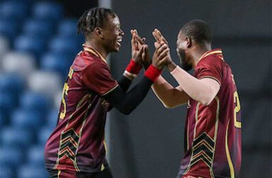 Nathan Edward (left) of the Leeward Islands Thunder celebrates one of his five wickets with Karima Gore during their match against the Barbados Pelicans (Photo courtesy CWI Media