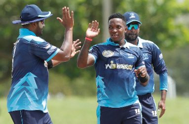 Former Test speedster, Fidel Edwards (centre), celebrates a wicket (Photo courtesy US Masters T20 Media)