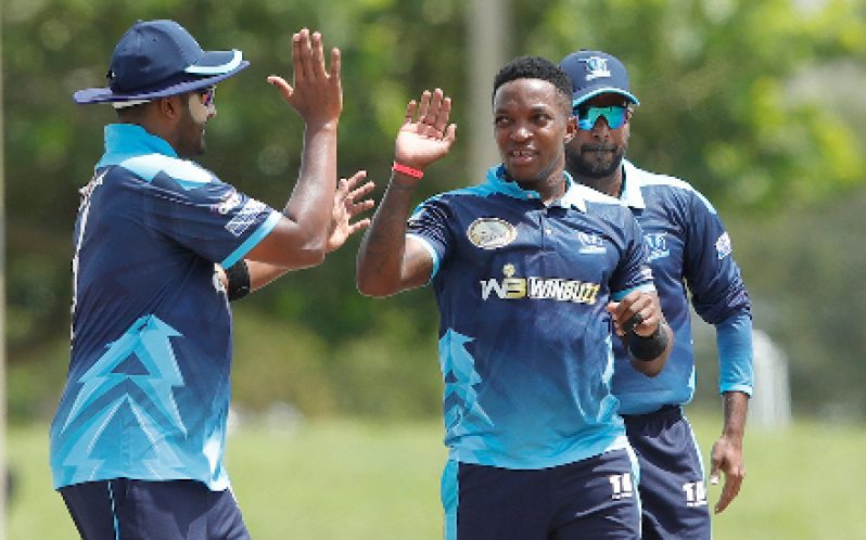 Former Test speedster, Fidel Edwards (centre), celebrates a wicket (Photo courtesy US Masters T20 Media)