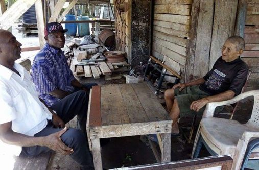 Some of the elderly farmers in discussion with Regional Vice-Chairman, Mr Elroy Adolph, second left