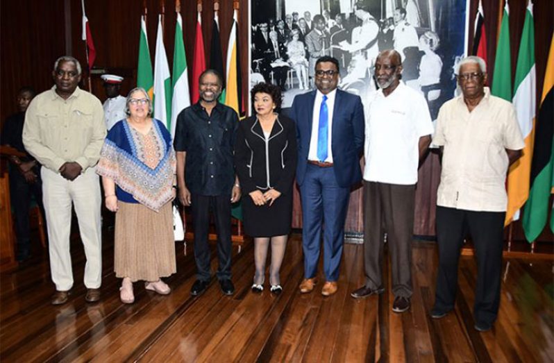 GECOM Chairman, Justice Claudette Singh, S.C, CCH (centre) flanked by Commissioners of the Elections Commission. From left are: Robeson Benn, Bibi Shaddick, Charles Corbin, Sase Gunraj, Vincent Alexander and Desmond Trotman (Adrian Narine photo)