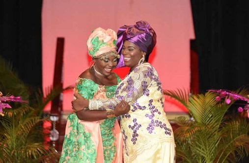 Miss Emancipation Queen 2018 Gabrelle Cummings, left, and First Runner-Up, Dr. Colleen Bovell share an embrace as Cummings is announced as the queen (Samuel Maughn photo)