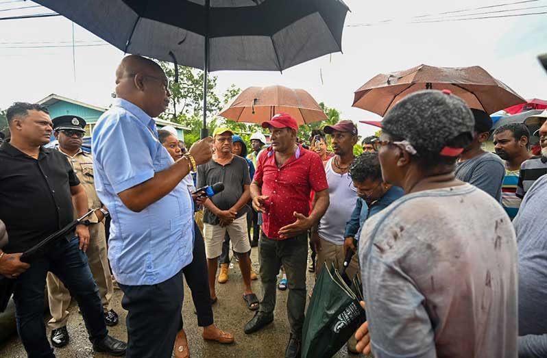 Minister of Public Works, Bishop Juan Edghill engaged with residents of Vriesland, West Bank Demerara on repairing their roadways