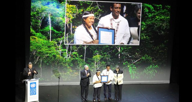 The South Central Peoples
Development Association (SCPDA),
which undertook a groundbreaking
project using GPS and smartphone
technology to create a map and
monitor lands traditionally used
by the Wapichan people, was on
Monday evening honoured with the
Equator Prize at the Climate Change
Conference ongoing in Paris. Here,
in this Neil Marks photo, Programme
Coordinator Nicholas Fredericks and
his wife Faye collect the award from
Administrator of the United Nations
Development Programme (UNDP),
Helen Clarke, at a star-studded
ceremony at the Mogador Theatre
in Paris chaired by Hollywood actor
Alec Balwin. The Prize, run by UNDP
with funding from the Norwegian
Government, comes with US$10, 000
cash grant.
GDF rank was on
