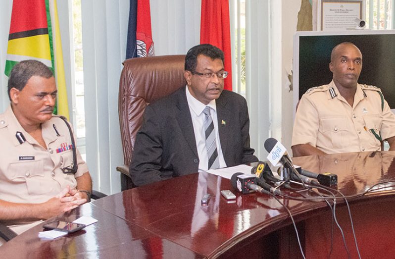 Acting Police Commissioner, David Ramnarine, Minister of Public Security, Khemraj Ramjattan and Director of Prisons, Gladwyn Samuels, during the media briefing