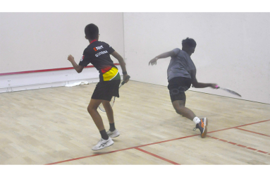 Ethan Bulkan (left) beat Justin Goberdhan 3-0 on Thursday night at NRC (Sean Devers photo)