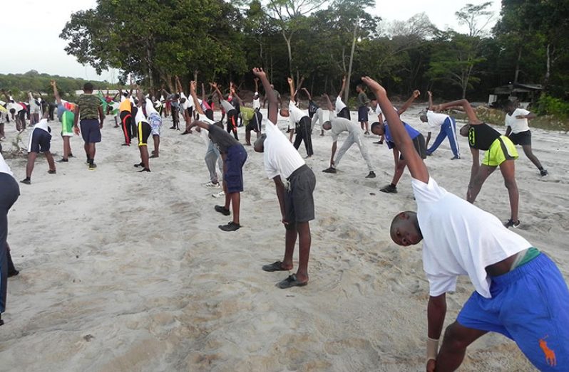 The youths involved in physical training sessions at the camp