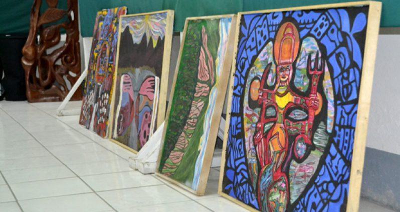 Several paintings which will be on display at the exhibition