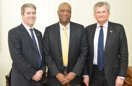 From left: Mr. Nick Forwood, Director- Strategic Defence and Security Management Services and Defence; Engineering, Design, Construction, Management (AECOM), Minister of State, Mr. Joseph Harmon and Mr. Russell Combe, Senior Security Sector Reform Advisor.
