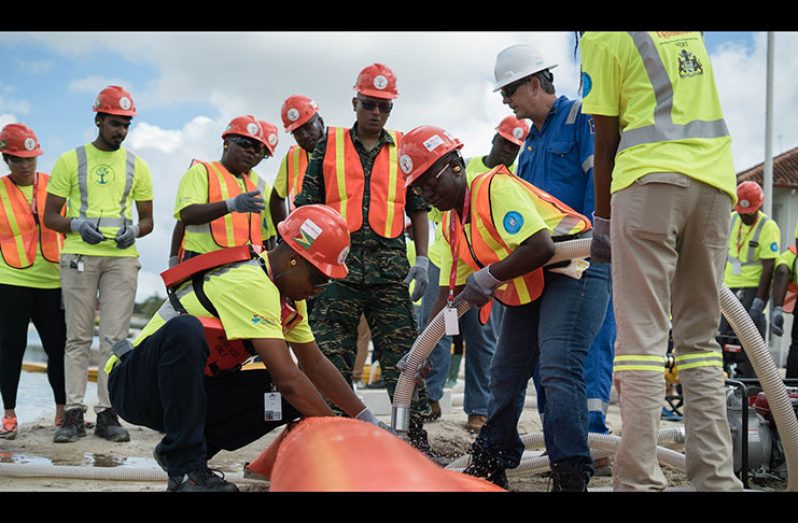 Participants engaging in the Oil Spill Response training