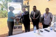 FAO Representative, Dr Gillian Smith, hands over keys of the renovated Mabaruma office to Mr. Enrique Monize, CEO of GLSC