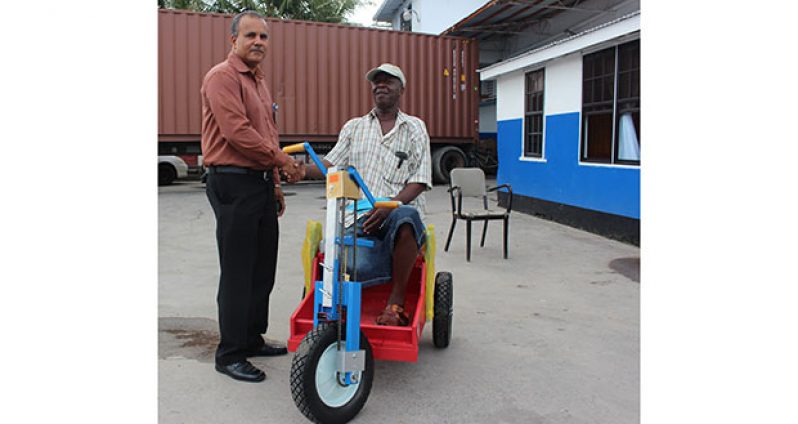 FFTP’s CEO, Kent Vincent (Left) shares a moment with recipient of the PET Cart, Michael Abrams.