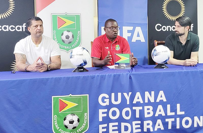 From left: Racing Madrid FC President Steve Nijjar, Guyana Football Federation Technical Director Bryan Joseph and UEFA UEFA Pro Licence coach Rubén de la Red at the press conference on Friday