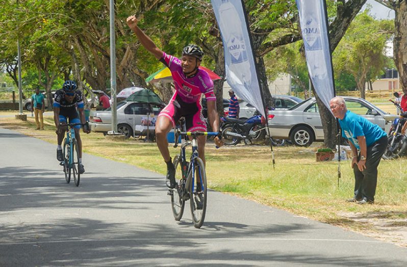 Michael Anthony reacts after crossing the finish line ahead of Briton John to cop the feature event of the 14th Annual Diamond Mineral Water 11-race meet. (Delano Williams photo)