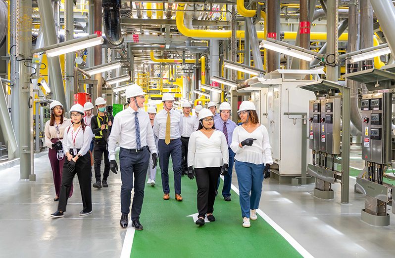 Prosperity FPSA Manager, Nadia Stampes, escorts First Lady Arya Ali and other officials during a guided tour of the Prosperity FPSO at the Keppel Shipyard in Singapore (Office of the First Lady)