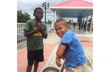Two friends at the spanking new Esplanade at Supenaam, Region 2 (Photo by Francis Q. Farrier)