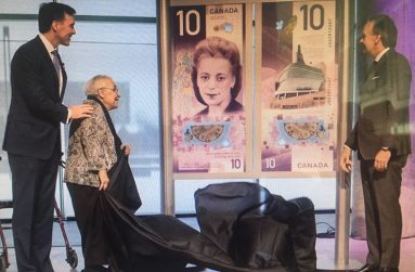 The unveiling of a jumbo image of the new Canadian $10 banknote. From left , Minister of Finance, Bill Morneau; Wanda Robson, sister of Viola Desmond who did the unveiling and Governor of the Bank of Canada, Stephen Poloz.