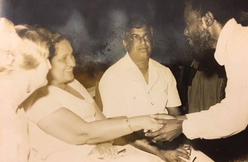 Farrier at right, extends respects to Prime Minister Sirimavo Bandaranaike of Sri Lanka, during her mid-1970s state visit to Guyana
