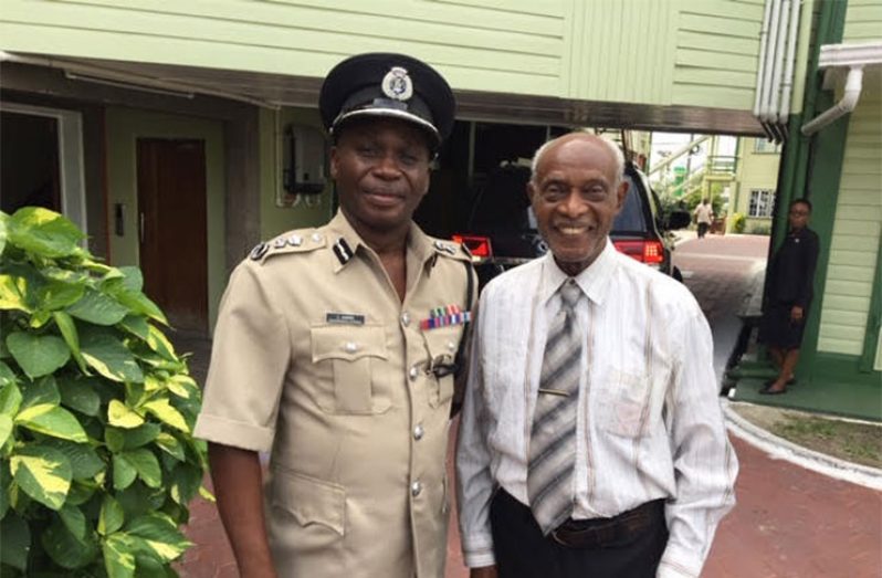 Present Police Commissioner Leslie James, DSS, DSM, with Francis Quamina Farrier