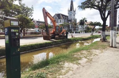 From left, one of the controversial Parking Meters, the Avenue of the Republic canal, a piece of heavy-duty equipment and in the background, the deteriorating City Hall (Photo by F.Q. Farrier - 2018)