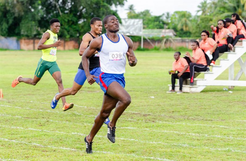 : Guyana Police Force athlete Davin Fraser breezing his way to win the men’s 100m at the Jefford Track and Field Classic in Linden. (Delano Williams photos)