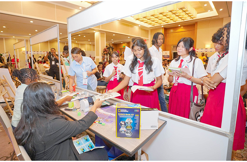 Students interact with exhibition booths during the youth forum at the Guyana
Energy Conference and Supply Chain Expo, exploring career and business
opportunities emerging across Guyana’s expanding energy sector. (Guyana
Energy photo)