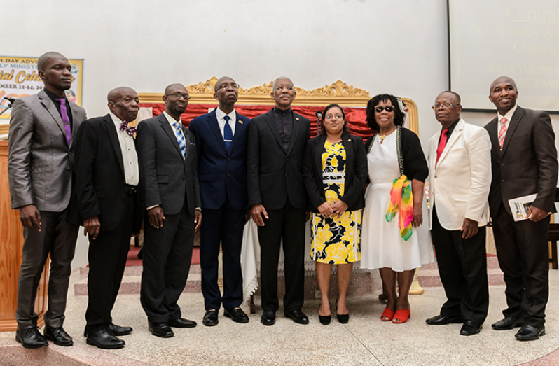 President David Granger (centre) is flanked by members of the Guyana Conference of Seventh-day Adventists (Delano Williams photo)