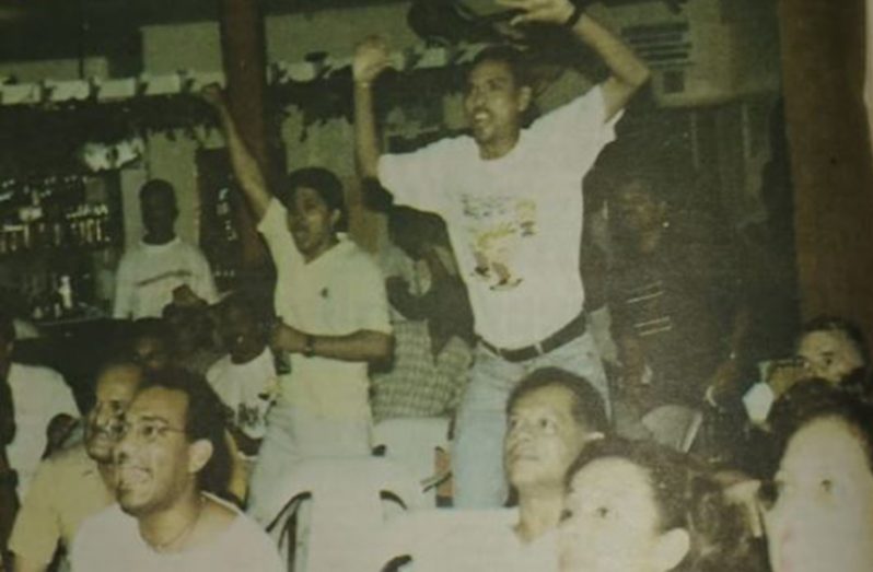 Flashback! In this Winston Oudkerk photo, Rehman Majeed (first from left standing in the back) cheers at Palm Court during the 1998 World Cup final when France beat Brazil 3-0.