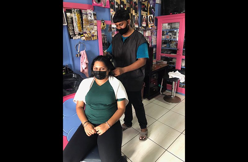 Faraz Ally is meticulous when it comes to giving haircuts